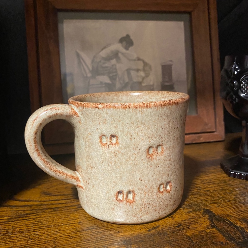 Rustic Ceramic Mug with Embossed Design